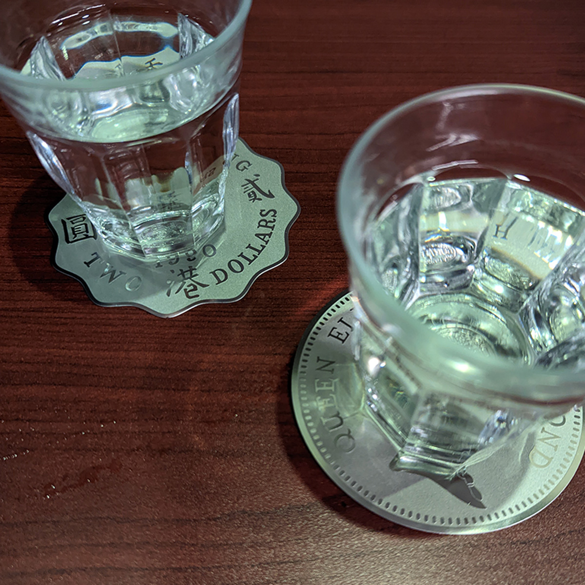 Product shot of Stainless Steel Coin Coaster in Use